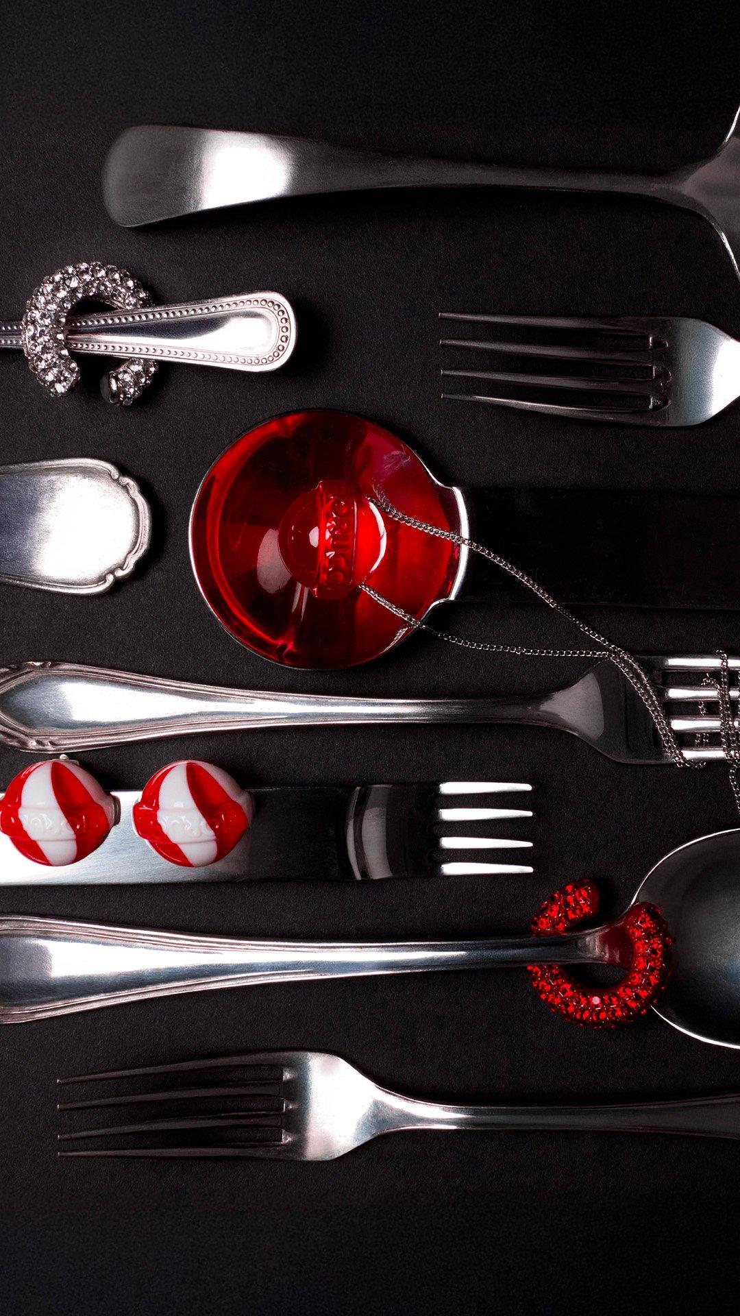 The picture features the Mini Lollipop Earrings in Multi color, the Crystal Ear Cuff in Silver, the Crystal Ear Cuff in Red and the Lollipop Necklace in Red.